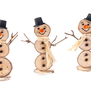 Little snowmen made from bark slices