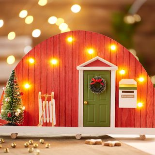 Candle arch with gnome door