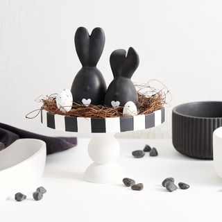 Moulded decorative bowl on foot with rabbit