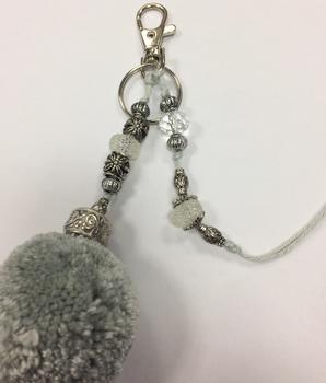 Keychain with beads and feathers
