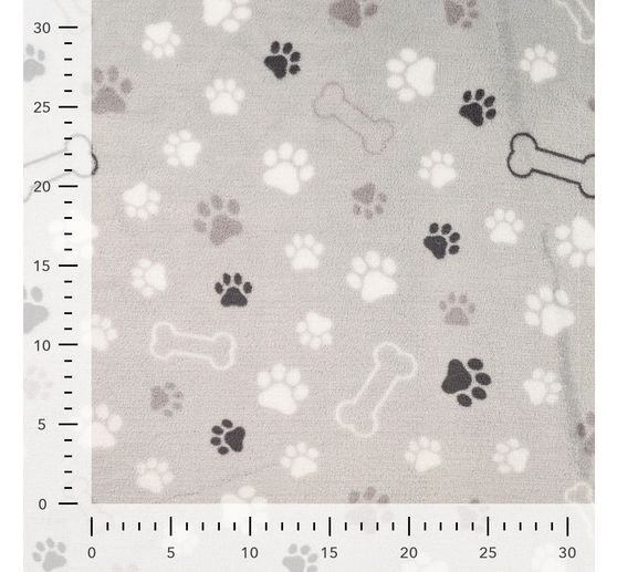 Tissu polaire au mètre « Pattes et os »