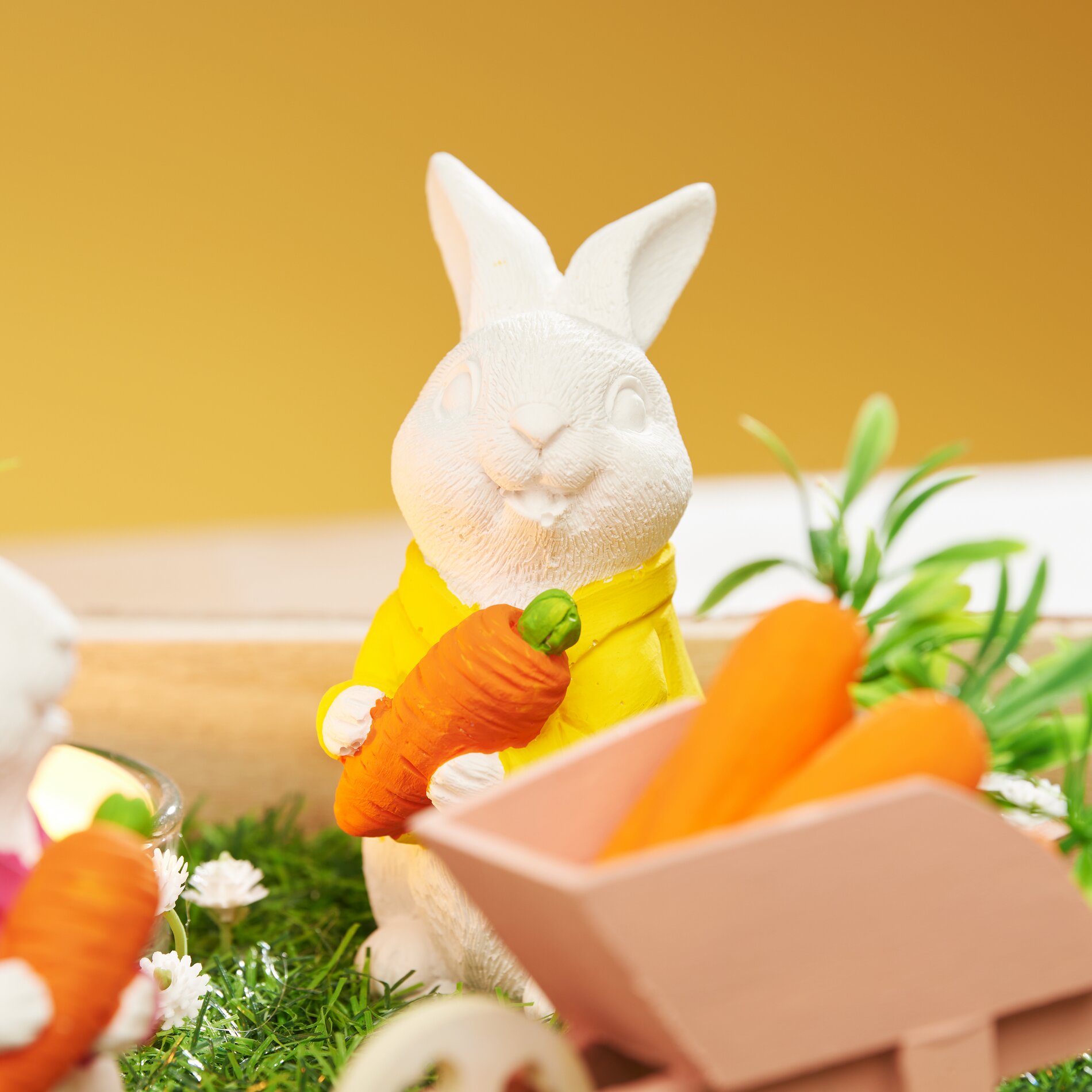 Gegossene Hasen in Miniaturlandschaft