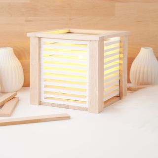 Wind light made from wooden and cast blocks